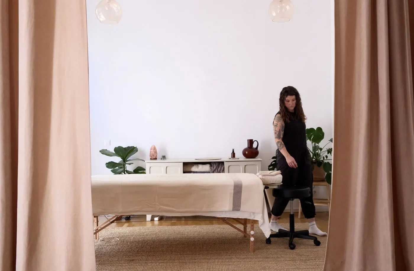 Amy in the bright massage room at Soul Treats studio, Berlin Mitte